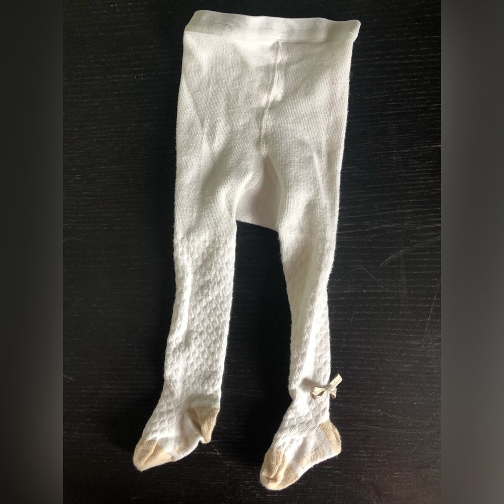 Authentic Burberry Baby Knit Footed Tights. Classic Burberry on right ankle.